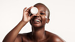 Portrait, skincare and black woman in studio with face cream, lotion container and antiaging benefits. Person, smile and apply moisturizer for dermatology, wellness or clear skin on white background.