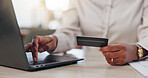 Person, hands and laptop with credit card in office for online shopping, payment or banking. Employee, shopper or computer with debit for ecommerce app, wireless transaction or fintech in workplace