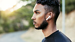 Man, fitness or nature with earphones for outdoor workout, exercise or music on mountain road. Active, male person or profile of runner with ear piece for audio streaming, sound or training playlist