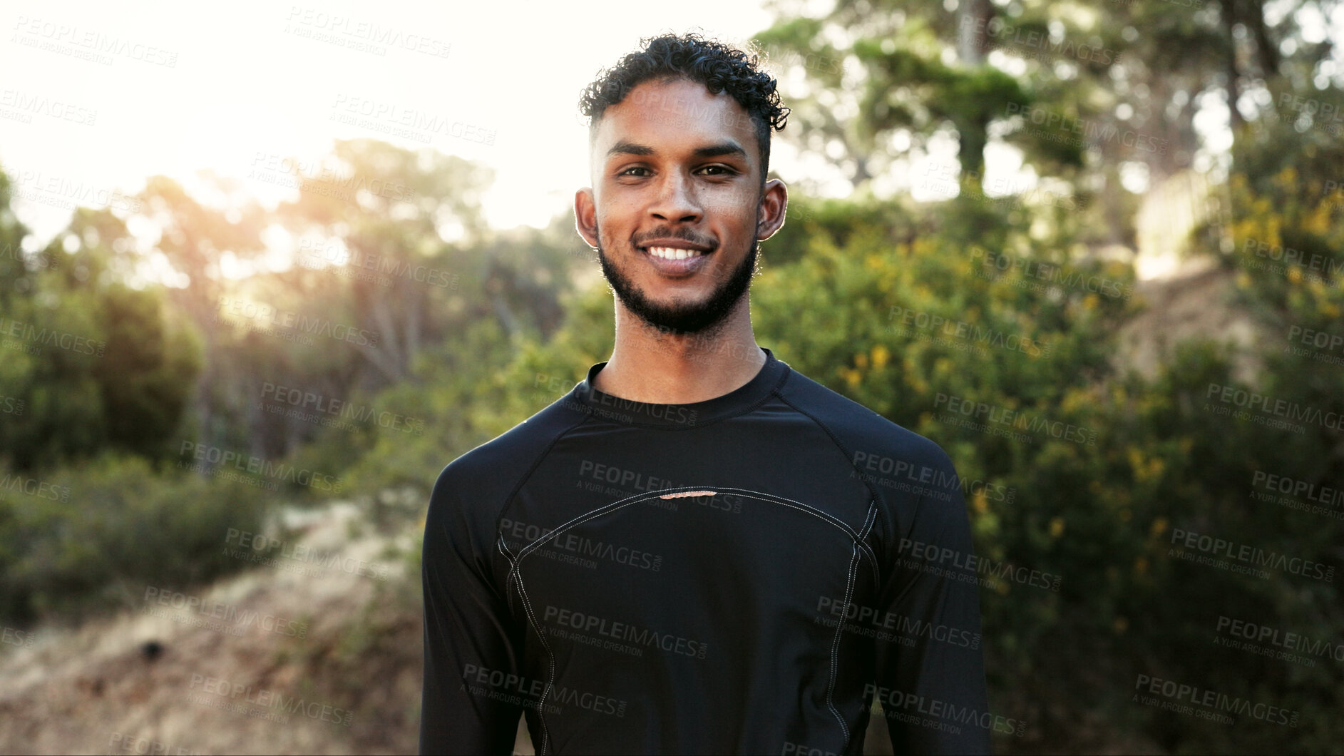 Buy stock photo Happy man, portrait and fitness in nature for outdoor exercise, workout or run in wilderness. Active, male person or runner with smile for physical activity, health or wellness in forest or woods