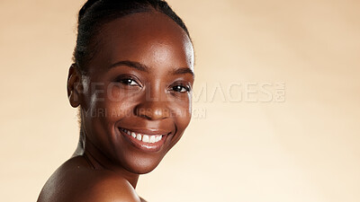 Buy stock photo Portrait, cosmetics and black woman in studio with smile, beauty mockup and skincare for glow. Space, confidence and African person with wellness, shine or aesthetic with dermatology on background