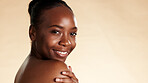Portrait, cosmetics and black woman in studio with aesthetic, beauty mockup and skincare for glow. Space, confidence and African person with wellness, shine or smile with dermatology on background