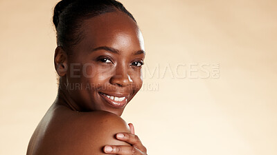 Buy stock photo Portrait, cosmetics and black woman in studio with aesthetic, beauty mockup and skincare for glow. Space, confidence and African person with wellness, shine or smile with dermatology on background