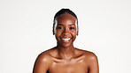 Portrait, skincare and black woman in studio with smile, beauty and dermatology for glow. Space, confidence and African person with wellness, shine or aesthetic with cosmetics on white background