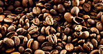 Closeup, roasted and organic beans for coffee production, textures and sustainable harvest. Granules, arabica grain and manufacturing process of caffeine, beverage extraction and espresso ingredients