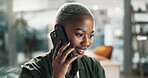 Happy, black woman and discussion with phone call in office for online advice or communication. Female person, consultant or agent talking with smile on mobile smartphone for business conversation