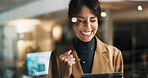 Happy woman, night and winning with tablet in office for business success or promotion. Excited, female person or working late with smile or fist pump for achievement, bonus or good news in workplace