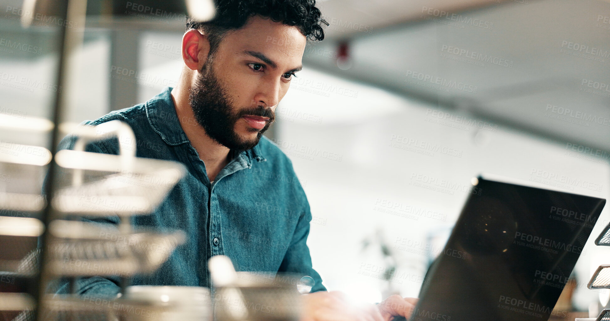 Buy stock photo Serious, man and typing on laptop in office for app development, site test or software update. Web designer, person and tech at workplace for problem solving, system maintenance and debugging network