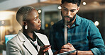 Business people, tablet and team at glass wall in office at night, notes or review project at finance company. Woman, man and tech with app, window and feedback report at asset management agency