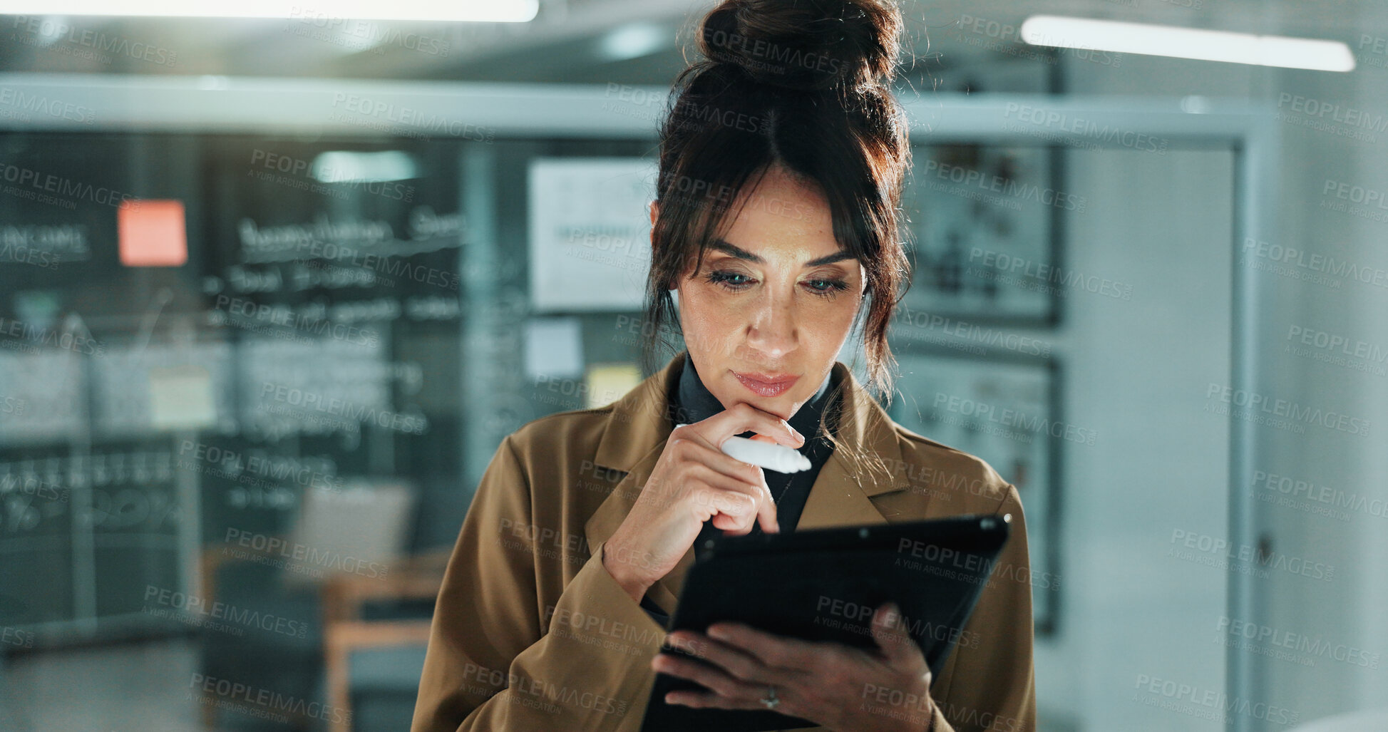 Buy stock photo Reading, thinking and business woman with tablet in office for compliance review, project or report. Tech, mature person and advisor in workplace, problem solving or policy planning with idea