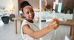 Black woman, writing or planning with glass board in office for schedule, tasks or agenda. Female person, employee or taking notes with marker for brainstorming ideas or project reminder in workplace
