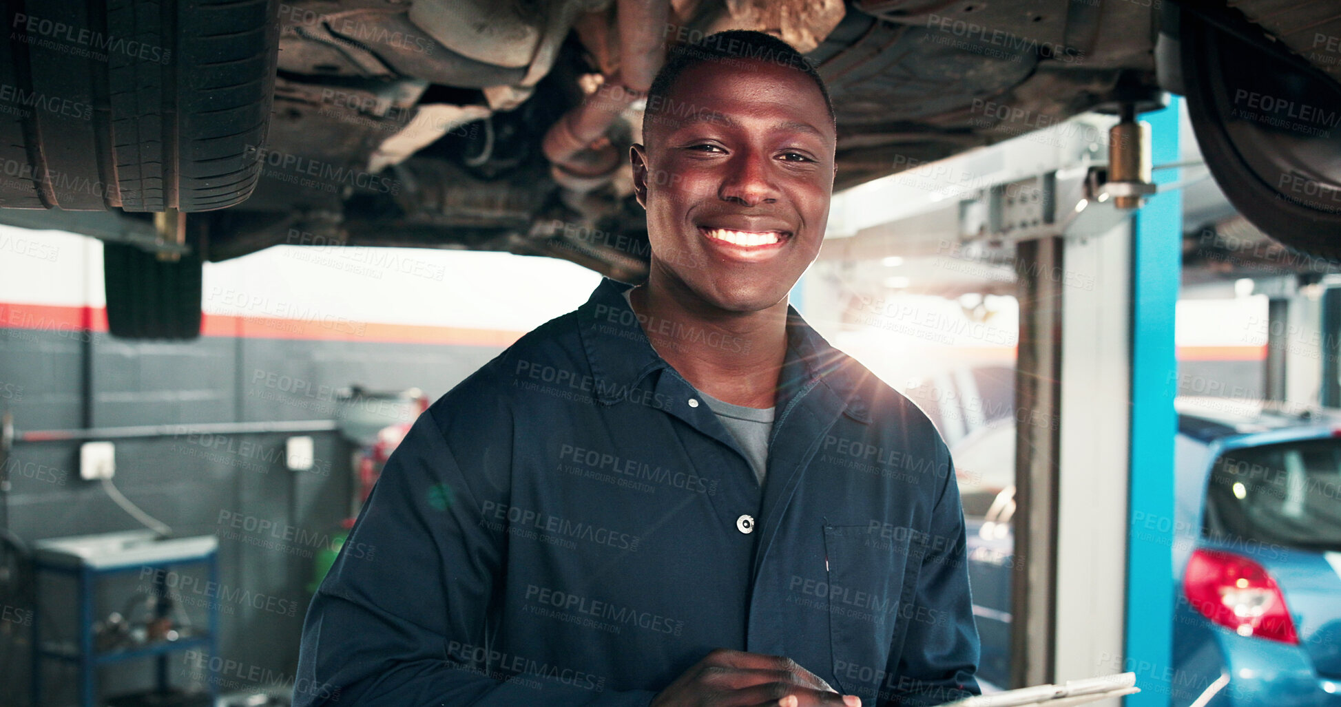 Buy stock photo Mechanic, portrait and black man with car in auto repair shop for diagnostic system, transport or calibration. Engineering, maintenance and tablet with happy person in garage for service report