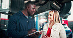 Garage, customer and mechanic with clipboard for car service, chat and happy with damage assessment. Repair shop, man and woman with smile for consultation, flare and quote for vehicle maintenance