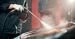 Mechanic, car and person with pressure washer for cleaning, maintenance and auto service. Workshop, garage and people with tools for vehicle inspection, fixing and performance for engine repair