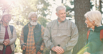 Buy stock photo Senior, friends and talking on hike in forest for travel adventure, walking pause and flare. Active retirement, old people and conversation on trekking break in woods for exploring, fresh air or trip