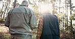 Hiking, walking and back of senior couple in forest for  wellness, active hobby and fresh air. Travel, retirement and elderly man and woman on nature trail for adventure, health and exercise outdoor