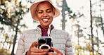 Hiking, happy and senior woman with phone for wellness, fresh air and online app for navigation. Travel, typing and elderly person on smartphone for direction, health and exercise on nature trail