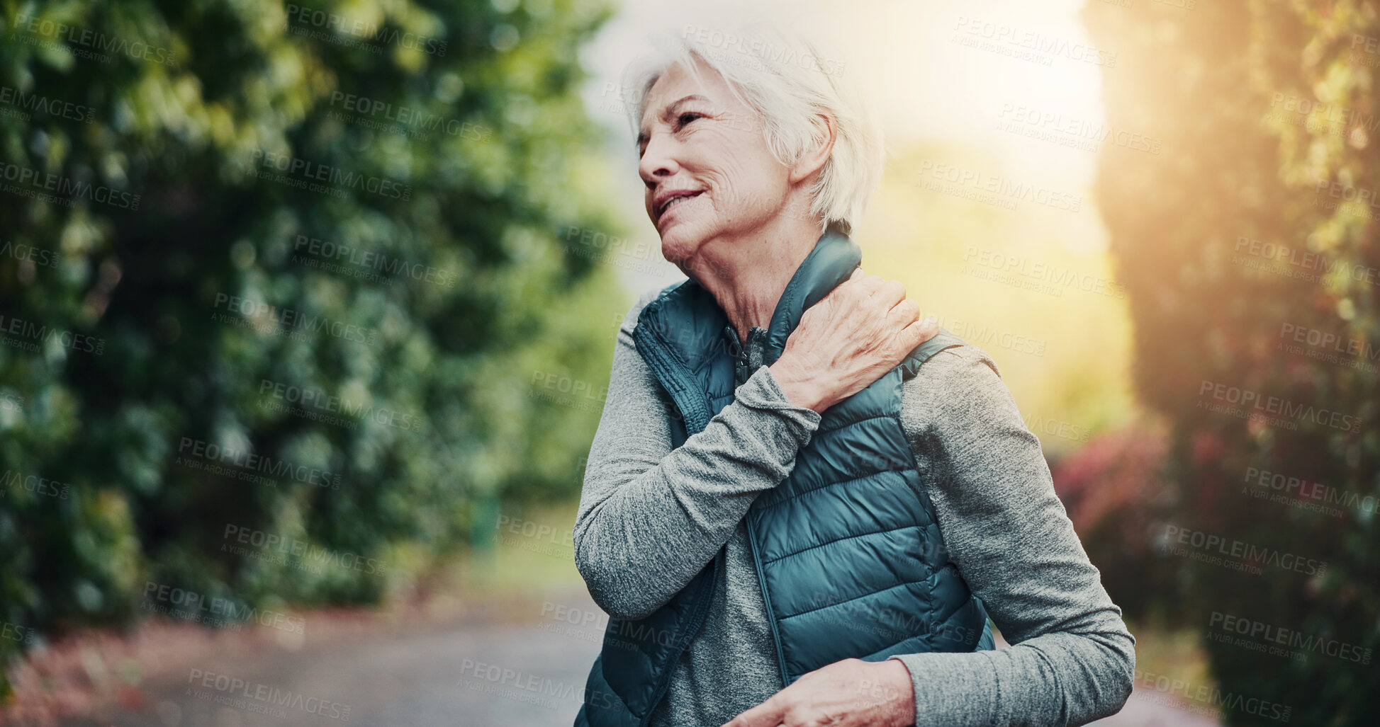 Buy stock photo Outdoor, fitness and old woman with shoulder pain at park, hurt or joint tension with workout injury. Space, exercise and senior person with fatigue after training accident, health and muscle strain
