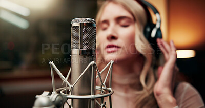 Buy stock photo Singer, microphone and person in studio for music, production or musician in performance. Talent, pop recording and woman in booth with tech, song and sound entertainment for creative album.