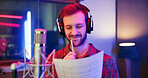 Thinking, man and musician with sheet in studio for songwriting, writing lyrics and recording audio. Male person, reflection and headphones with mic for music production, composing song and rehearsal