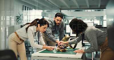 Buy stock photo Team, engineering and robotics with business people in office for mechatronics, meeting and programming. Collaboration, prototypes and  planning with employees for system function and project
