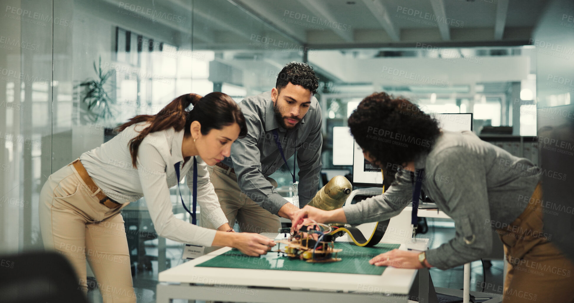 Buy stock photo Team, engineering and robotics with business people in office for mechatronics, meeting and programming. Collaboration, prototypes and  planning with employees for system function and project