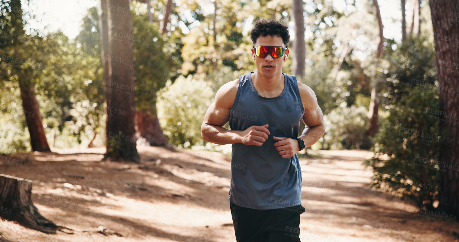 Buy stock photo Running, fitness and man with sunglasses in nature for training, exercise and workout for cardio. Sports, athlete and person on outdoor trail for active hobby, endurance and wellness for health