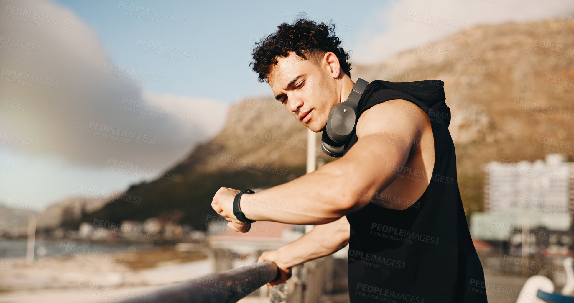 Buy stock photo Fitness, smart watch and runner with man at beach for workout stats, distance tracking and health. Exercise performance, wellness and tech with person outdoor for speed monitor and stopwatch
