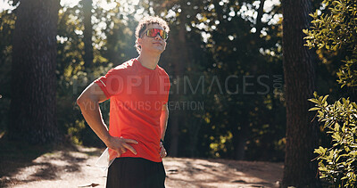 Buy stock photo Fitness, thinking and man in nature for exercise, training and fresh air for health, wellness and calm. Space, athlete and person in woods for reflection, thoughtful and rest for active hobby outdoor