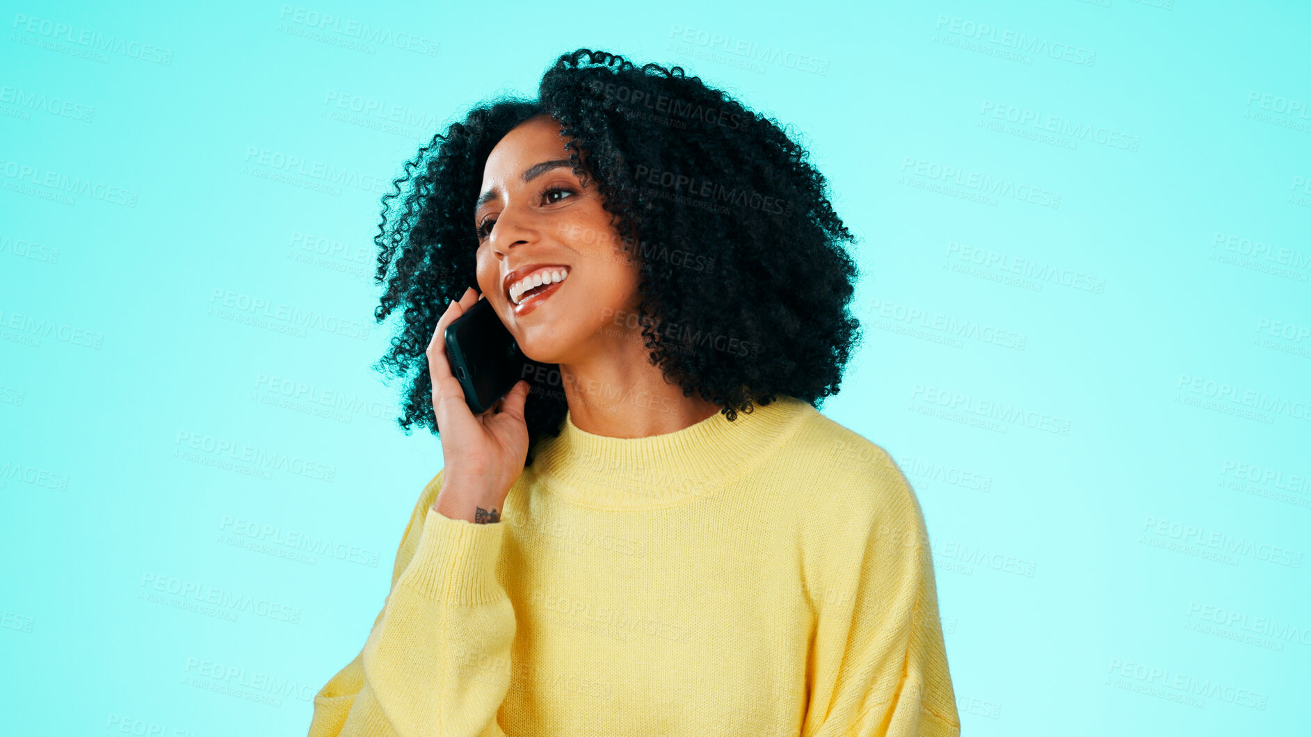 Buy stock photo Phone call, laugh and woman in studio for communication, joke and chat or discussion. Tech, conversation and female person with contact for news, gossip and comedy story with space on blue background