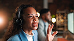 Night, call center and woman with advice, headset for communication or system solution. Evening, person or employee in office, discussion or customer service for help desk or contact us for feedback