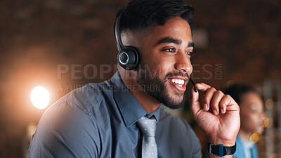 Buy stock photo Night, call center and man in workplace, headset for communication and customer service. Late, person and employee in office, conversation and tech support for advice and contact us for feedback