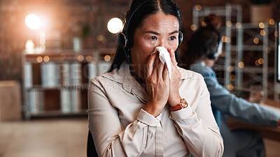 Buy stock photo Woman, tissue and sick with headset at office with cold symptoms, virus and legal advice job at night. Mature person, advisor or consultant with napkin for blowing nose, illness and flu at law agency