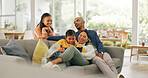 Parents, children and relax on couch with tablet, playing online game and bonding together on weekend. People, family and girls in house with digital tech, kids app and gaming website for wellness.