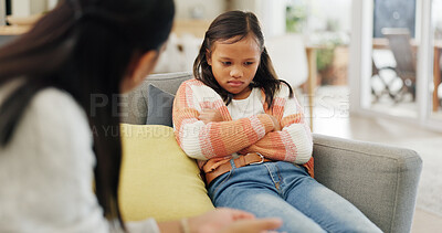Buy stock photo Discipline, upset and mom with child on sofa for behavior, trouble and consequences for bad attitude. Parenting, listen and mother with girl in lecture, discussion and scold for family rules in home