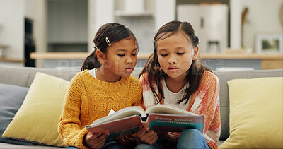 Buy stock photo Reading book, friends and girls in lounge, relax and education for child development. Home, discussion and kids on couch, storytelling and learning for growth, knowledge and hobby for imagination