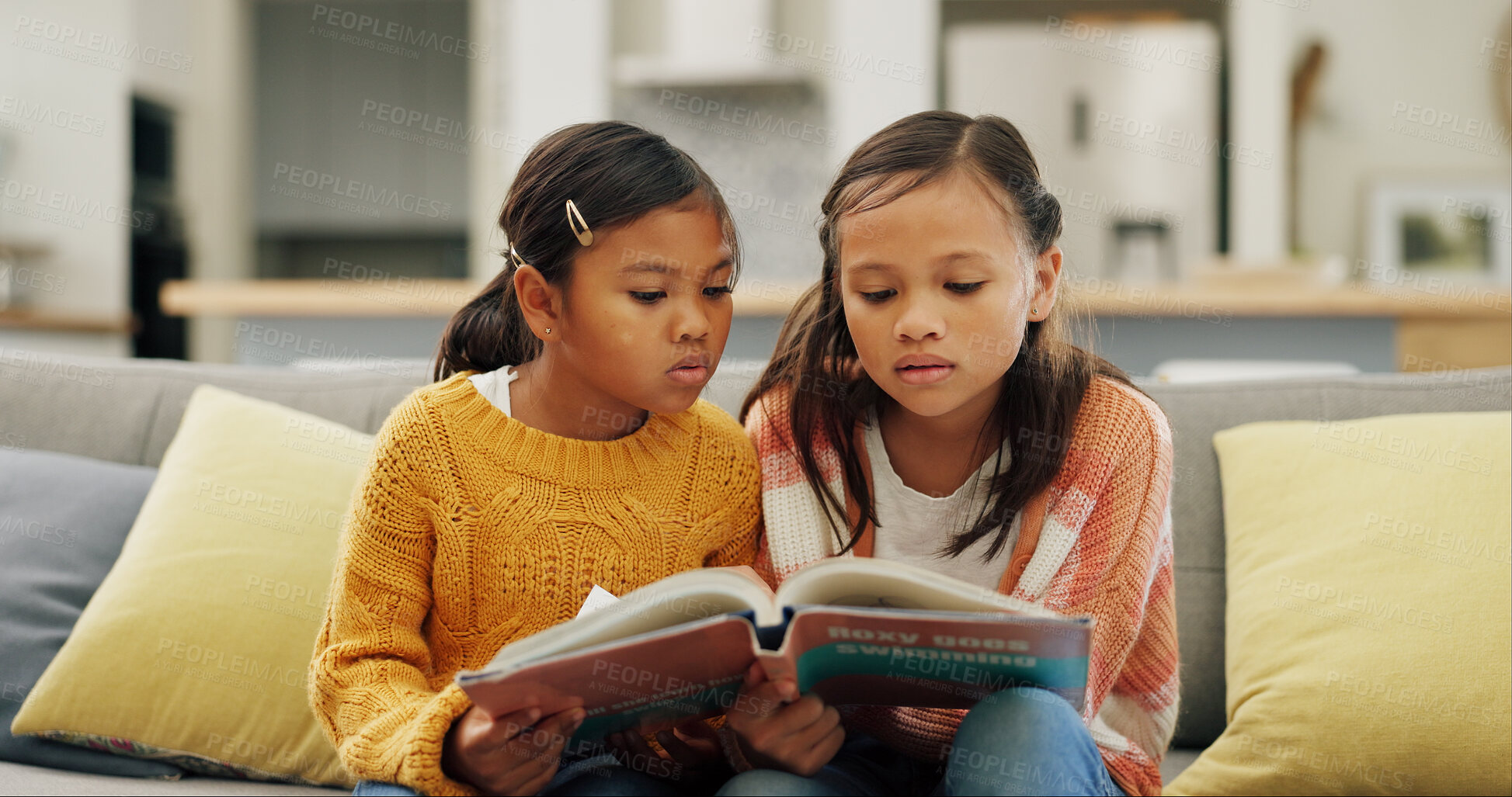 Buy stock photo Reading book, friends and girls in lounge, relax and education for child development. Home, discussion and kids on couch, storytelling and learning for growth, knowledge and hobby for imagination