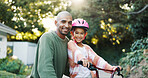 Development, portrait and father teaching daughter how to ride bicycle outdoor in front of home. Growth, safety and smile of girl child with single parent man in driveway for cycling or learning