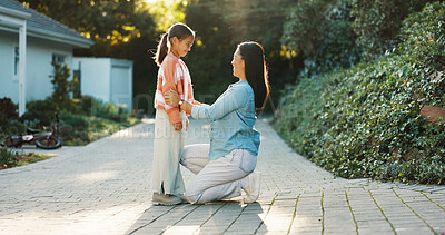Buy stock photo Child, mother and smile for care at backyard, connection and bonding together for learning by house. Mom, girl and happiness with kid for growth, love and teaching with parent outdoor by family home
