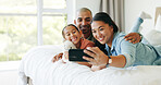 Happy family, parents and girl with selfie on bed, social media update and bonding for weekend break. Profile picture, toy and people with child for photography, support and smile together in home
