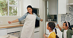 Dance, mother and children with smile in kitchen, holiday celebration and family bonding on weekend. Connection, woman and girls with happiness in home for care, music and groove for fun together