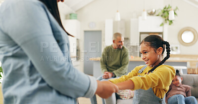 Buy stock photo Mother, dance or holding hands with child in living room, family support or bonding for relationship. Connection, woman and girl with happiness in home on weekend, music and groove for fun together