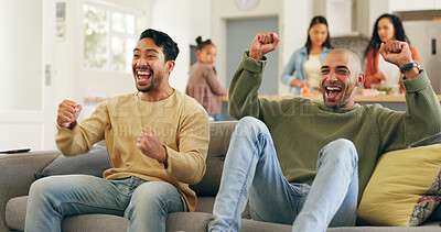 Buy stock photo Celebration, happy and men watching sports on sofa in home with winning, goal or achievement. Cheering, excited and male friends streaming football or soccer together in living room at apartment.