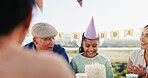 Family, child and cake for birthday in home, laughing together and clapping with generations. Dessert, happy girl and mother at party for special day, celebration and funny kid with grandfather