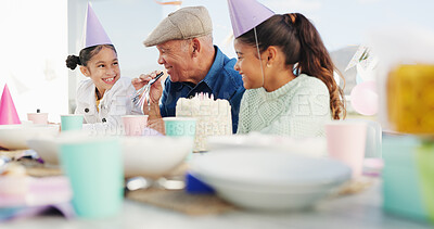 Buy stock photo Grandfather, kids and blower for birthday in home, bonding together and care with generations. Grandparent, happy girls and horn at party with cake, special day or children at family celebration