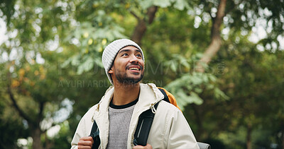 Buy stock photo Happy, thinking and hiking with man in nature for eco tourism, adventure and national park. Sustainability vacation, backpacking and trekking with person outdoor for wellness, idea and vision