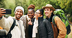 Selfie, hiking and travel with friends in nature for social media post, adventure and profile picture. Trekking holiday, photography memory and vacation with group of people outdoor for trip