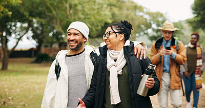 Buy stock photo Hiking, talking and couple in forest, smile and bonding together for vacation. Outdoor, man and woman in woods, discussion and happiness with trekking adventure, countryside and hug for support