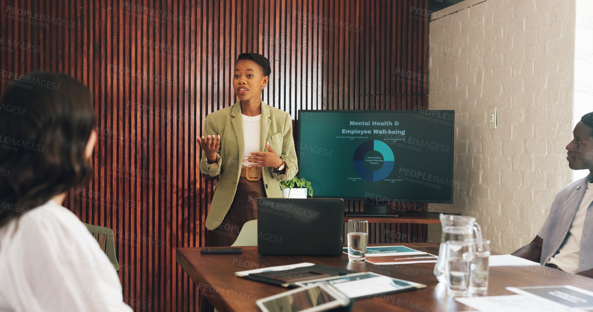 Buy stock photo Woman, presentation and mental health at office meeting with monitor, questions and graphs at hr company. Person, speaker and screen with team, feedback or review with charts for employee wellness