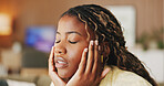 Worry, headache and black woman in home for overthinking, unsure and nervous for university results. Apartment, student and person with anxious, overwhelmed and stress for grade, school and college